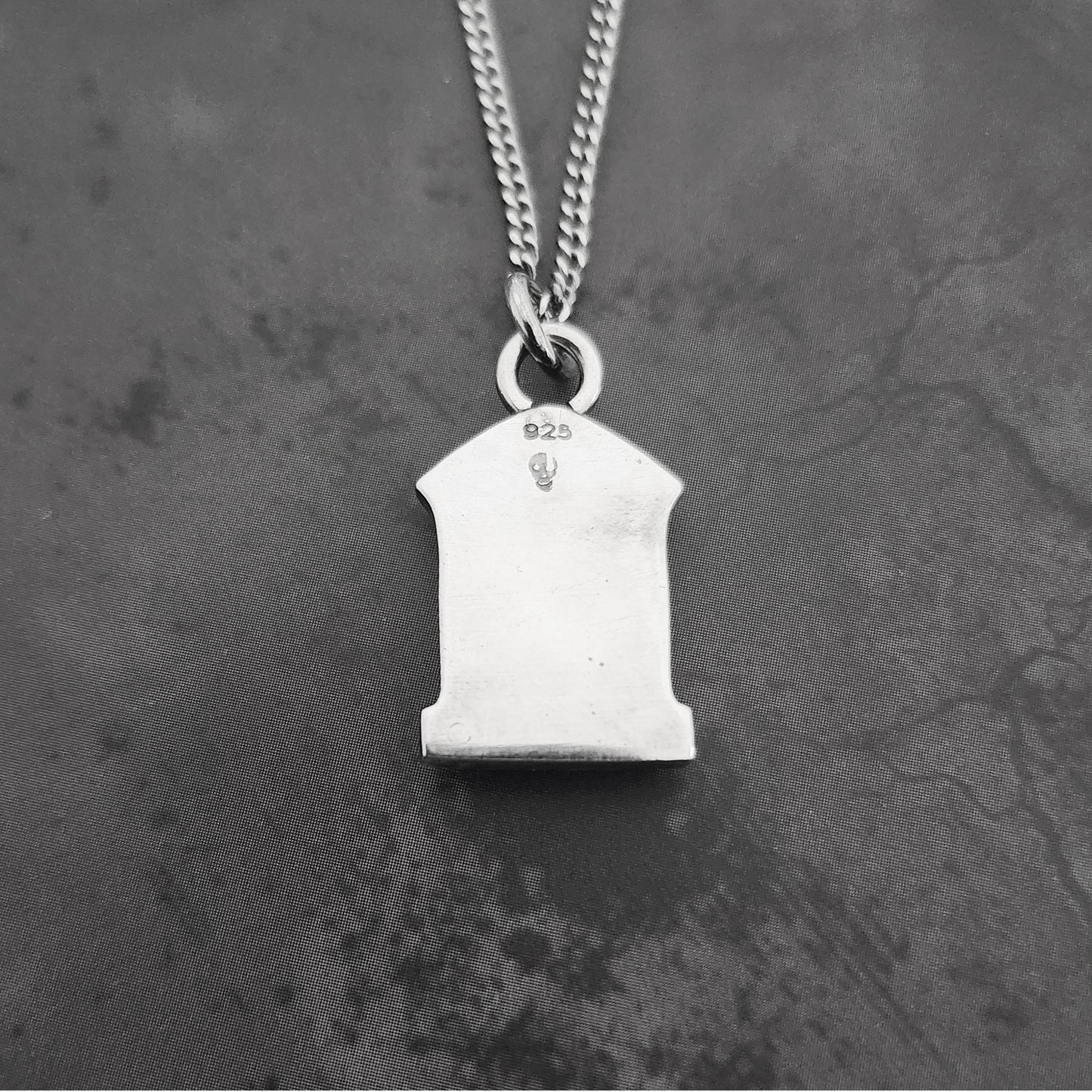 TOMBSTONE necklace with a skull