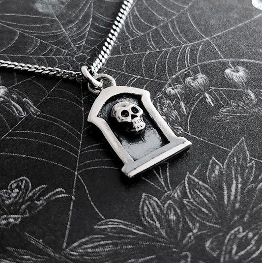TOMBSTONE necklace with a skull