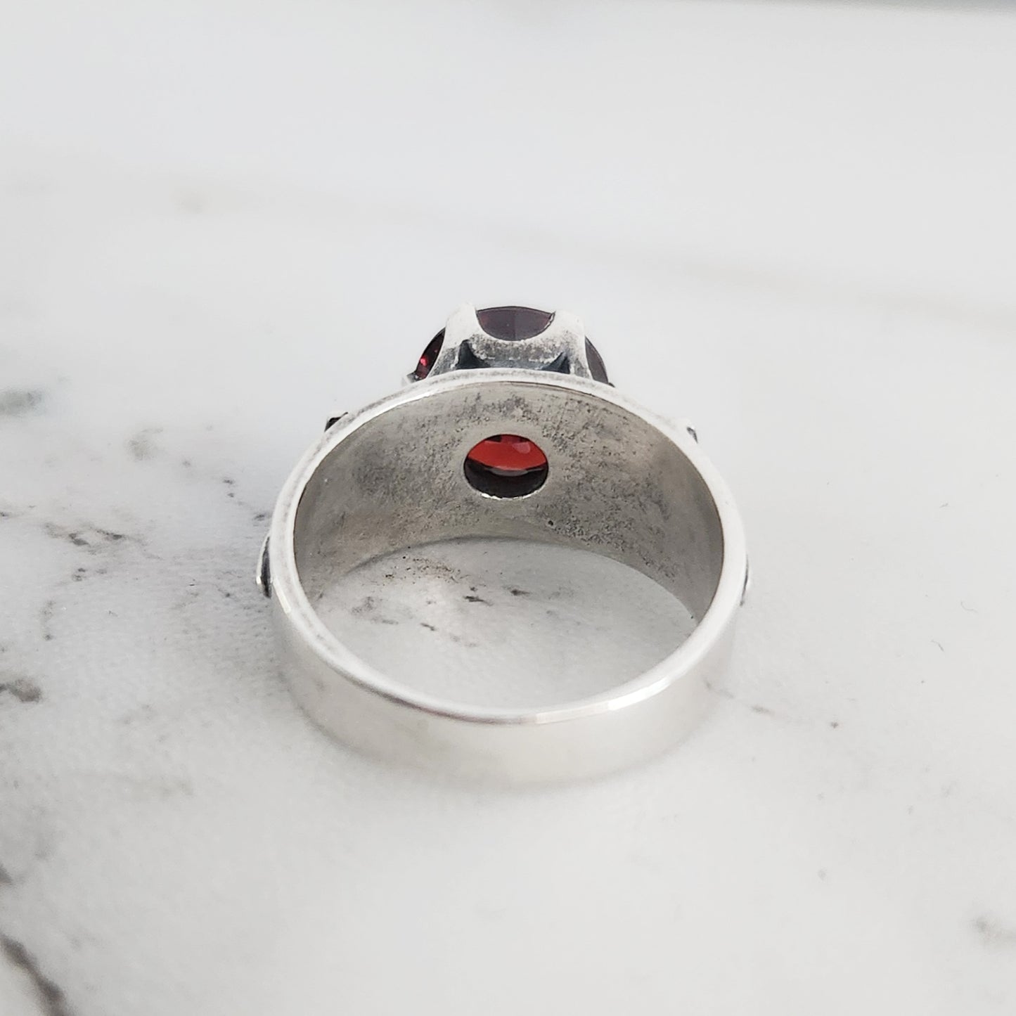 HELVETE ring with red cz