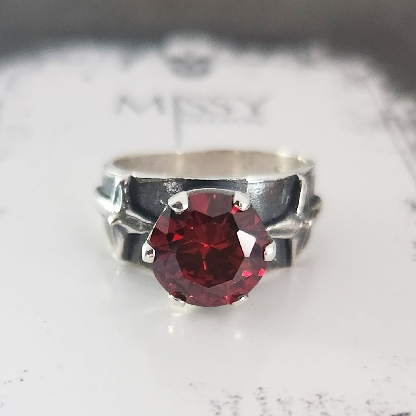 HELVETE ring with red cz