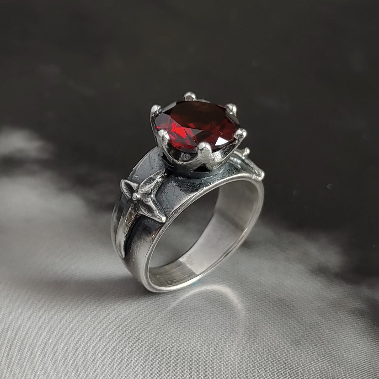 HELVETE ring with red cz