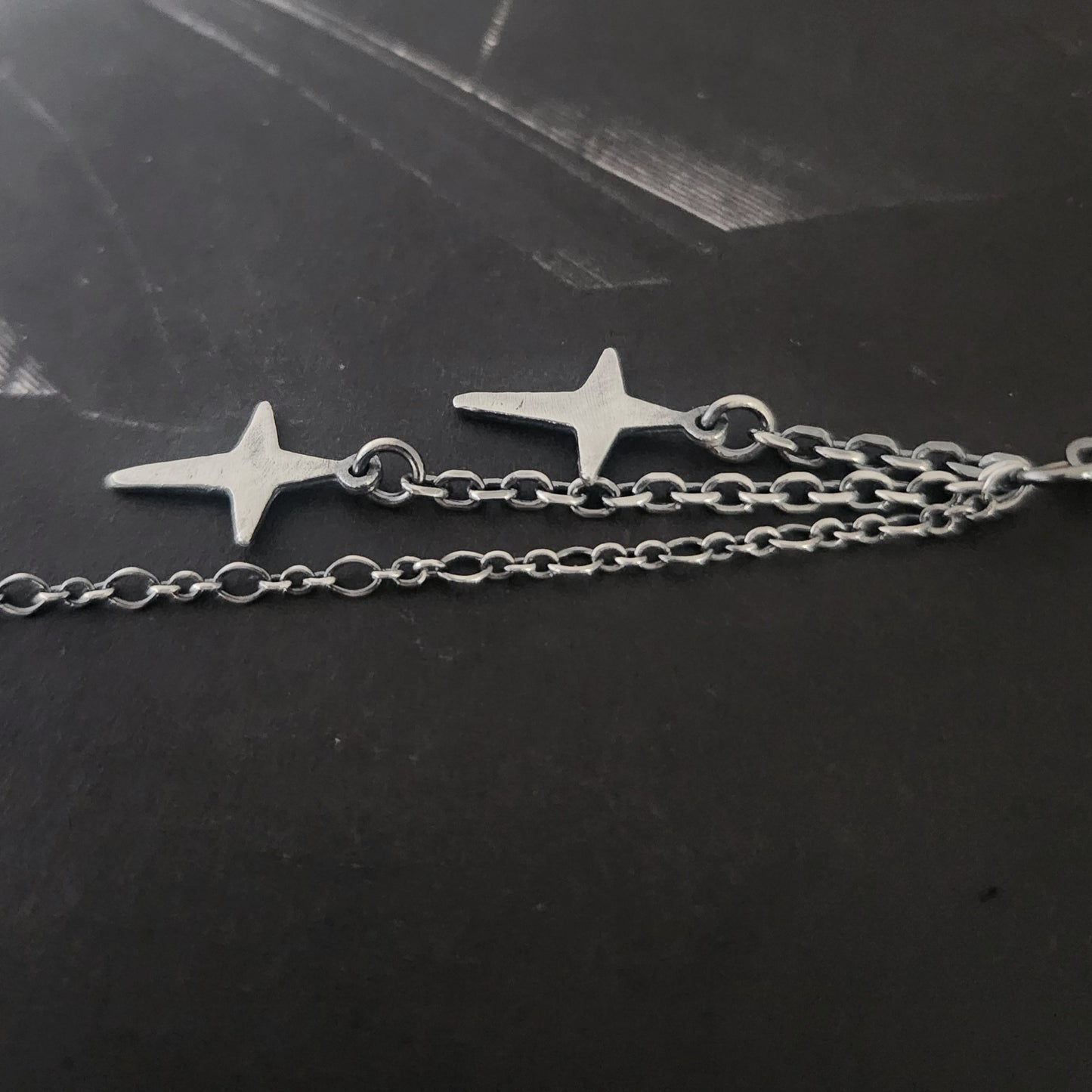 STAR-CROSSED earrings