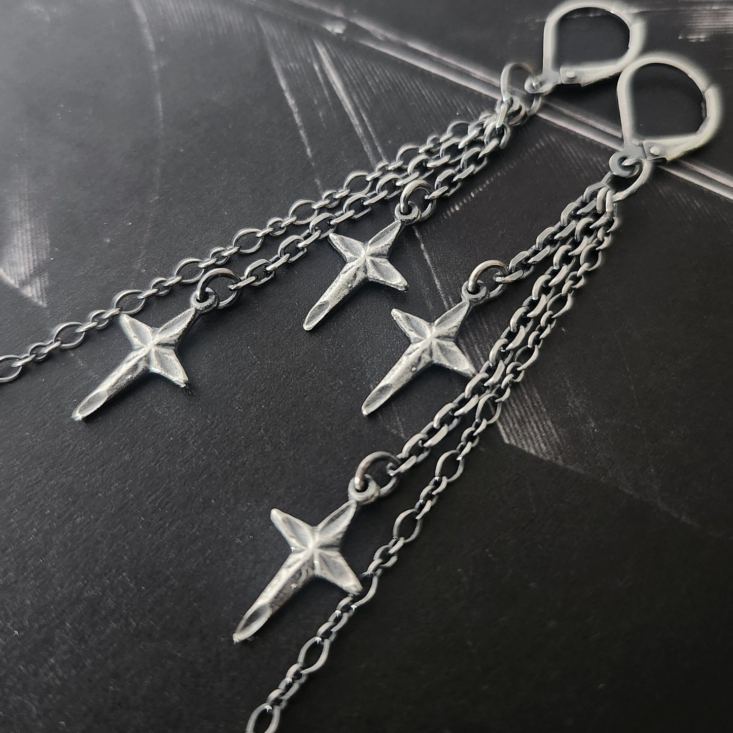 STAR-CROSSED earrings