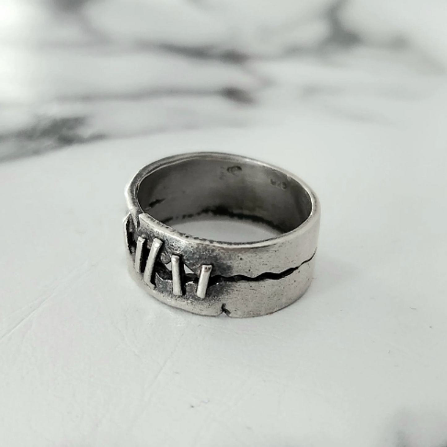 STITCHES ring