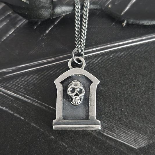 TOMBSTONE necklace with a skull
